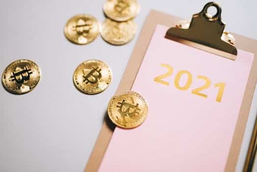 Gold Round Coins on White Paper