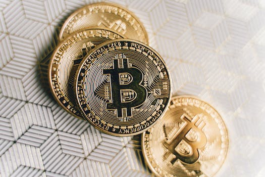 Close Up Photo of Four Bitcoins