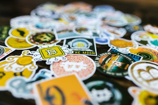 Heap of Bright Stickers with Bitcoin Logo Lying on a Table